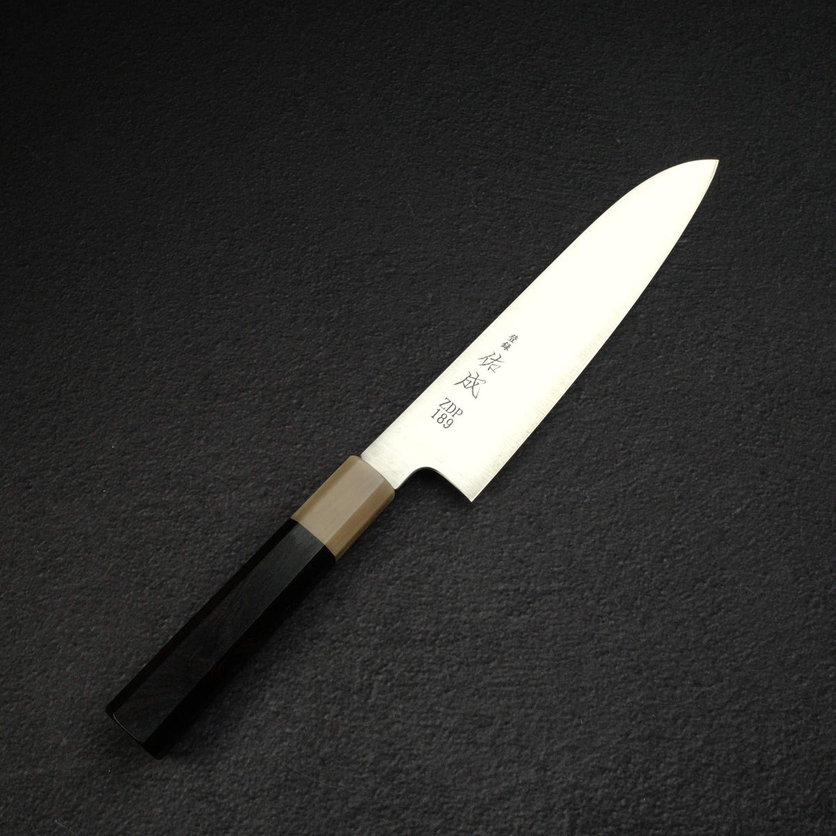 Sukenari ZDP-189 Hairline Santoku 195mm, Ebony Handle with Blonde/Marble Ferrule
